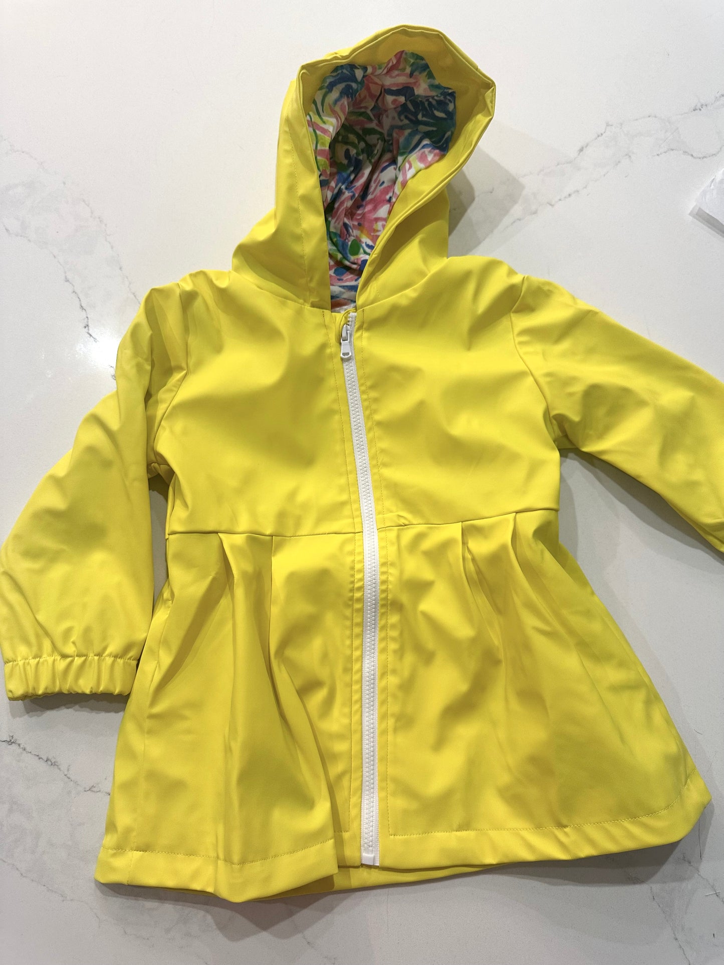 Girls yellow peplum Raincoat with bright printed interior