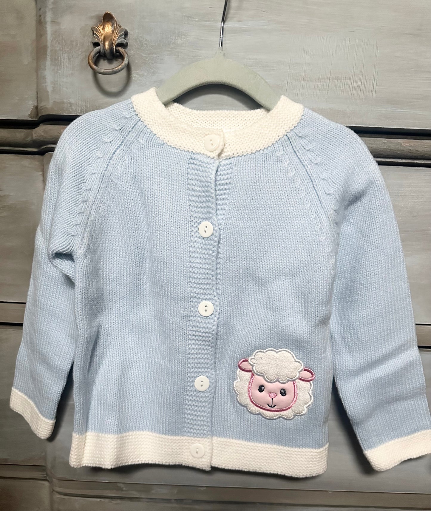 Girl cardigan with appliqued sheep pattern