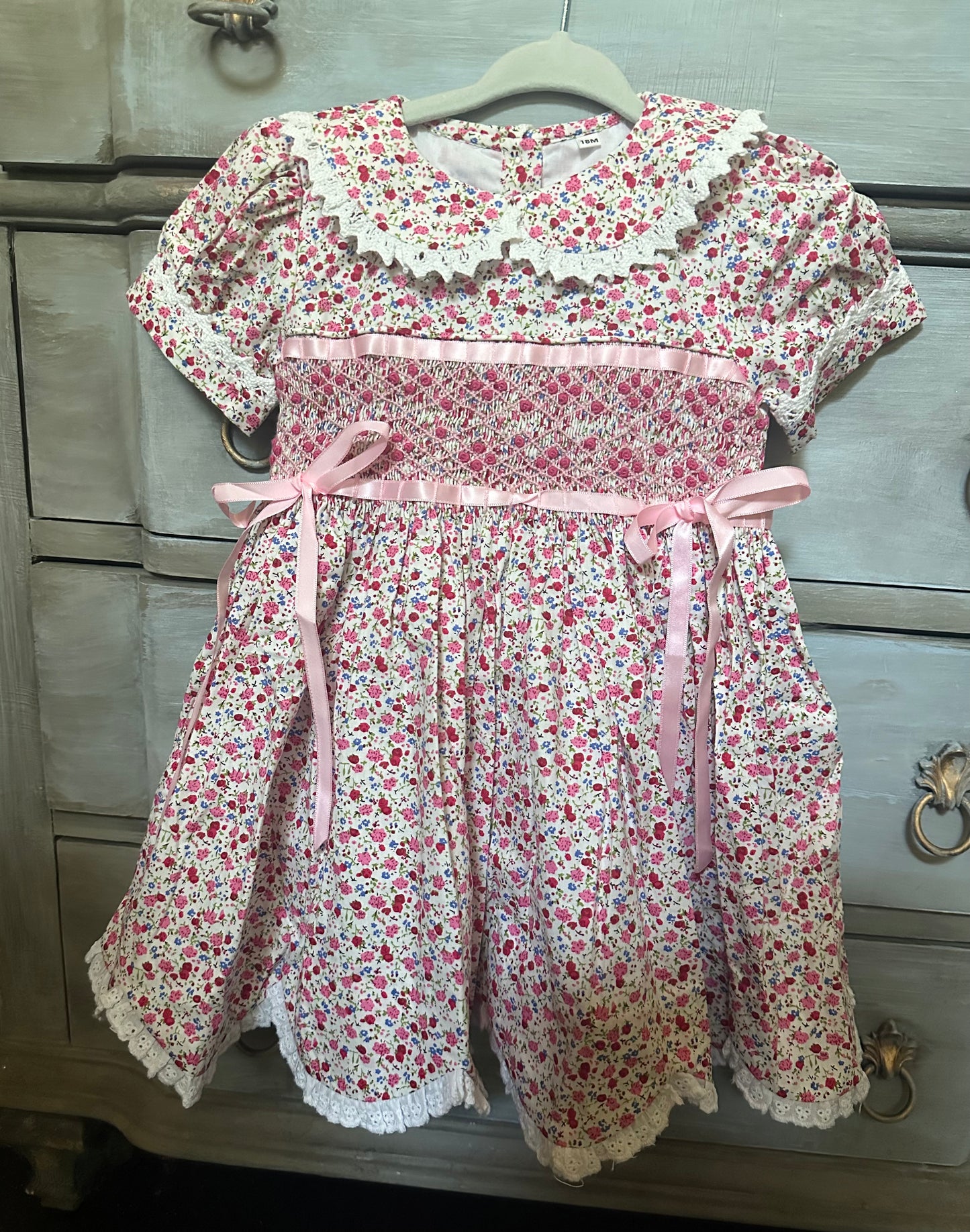 Handsmocked heirloom dress with satin ribbon