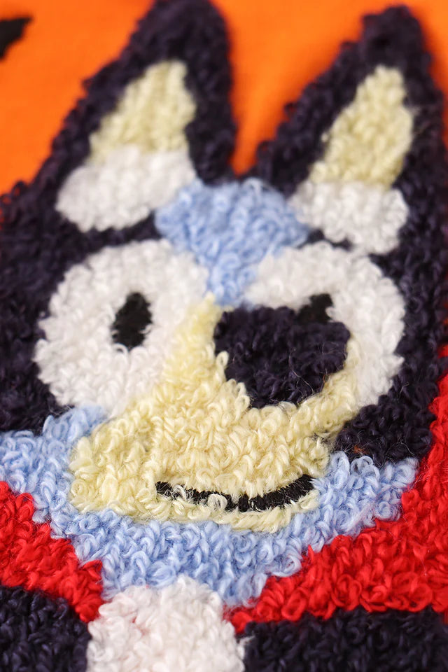 ORANGE HALLOWEEN CHARACTER FRENCH KNOT ROMPER