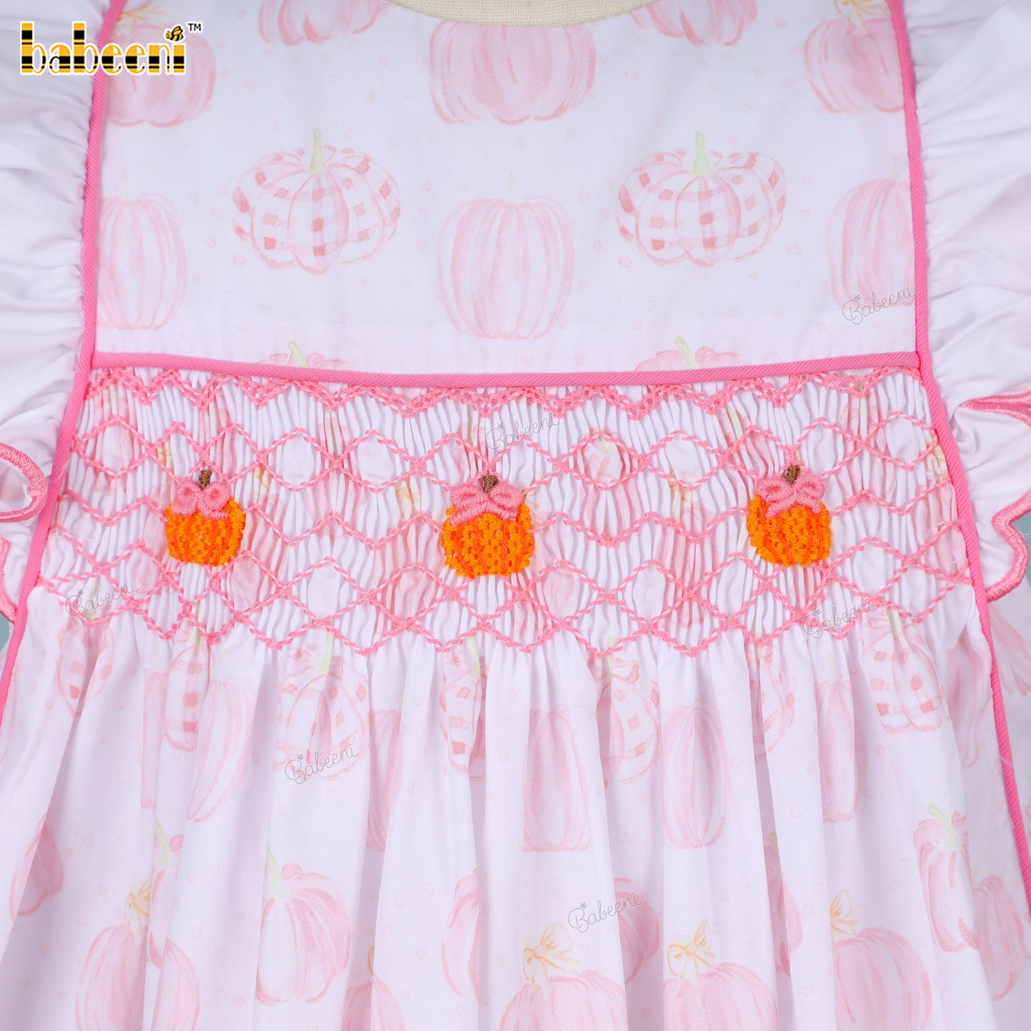 Pink pumpkin hand smocked dress