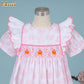 Pink pumpkin hand smocked dress