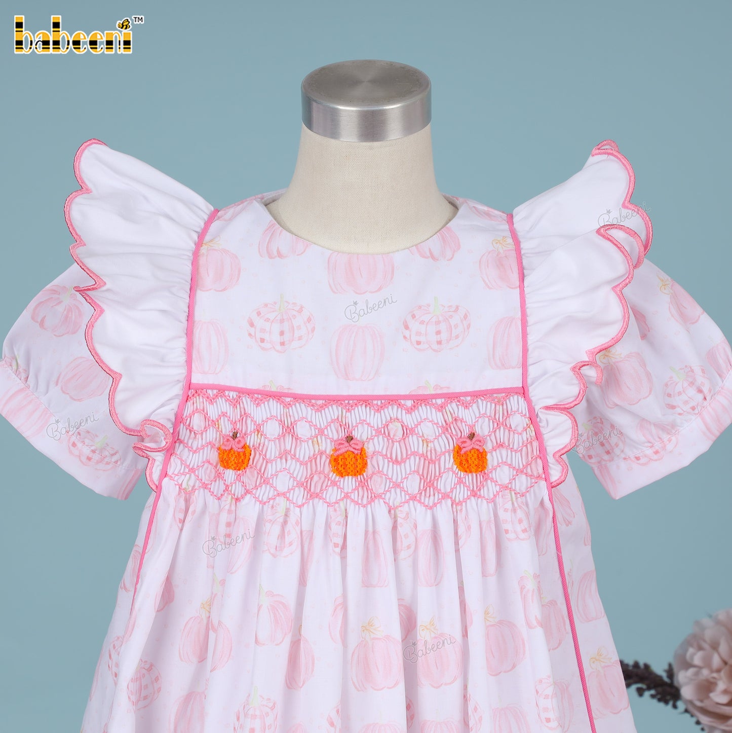 Pink pumpkin hand smocked dress