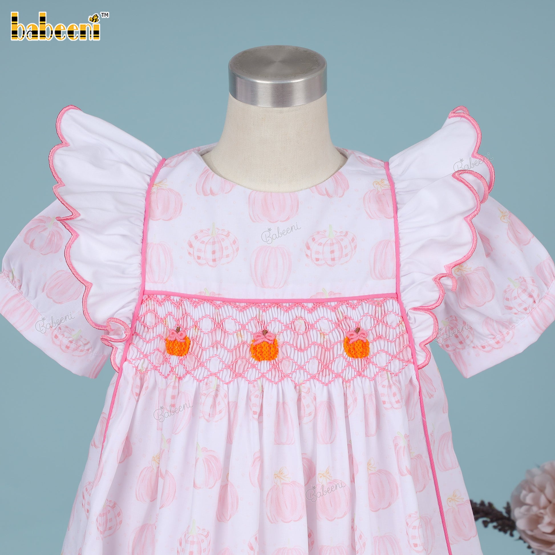 Pink pumpkin hand smocked dress