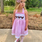 Pink character French knot seersucker dress with back bow