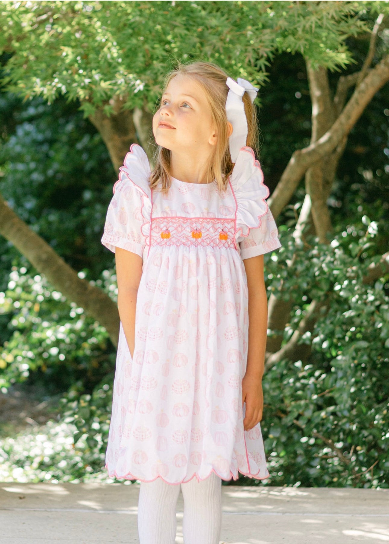 Pink pumpkin hand smocked dress