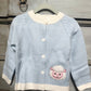 Girl cardigan with appliqued sheep pattern