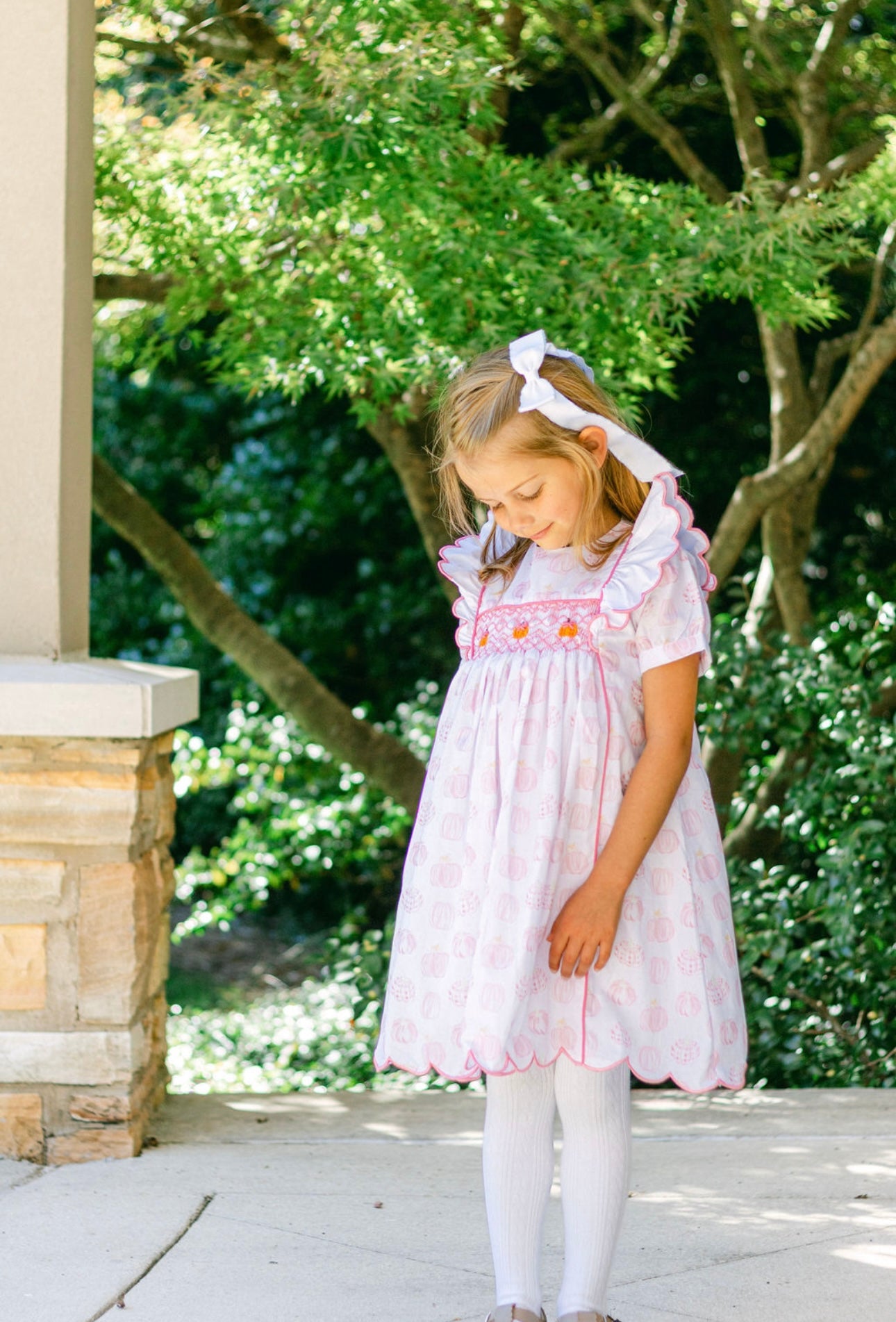 Pink pumpkin hand smocked dress