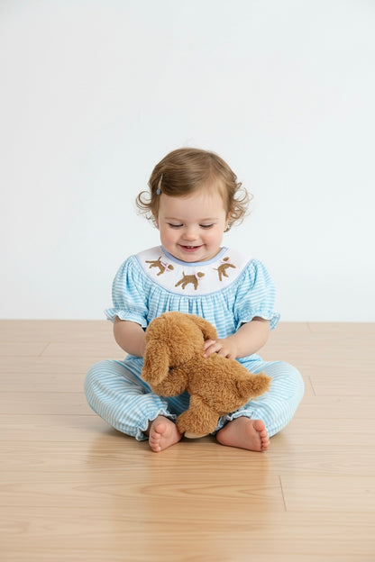 Blue puppy hand smocked girl romper