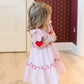 Valentine's theme in pale pink medium stripe dress