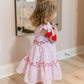 Valentine's theme in pale pink medium stripe dress
