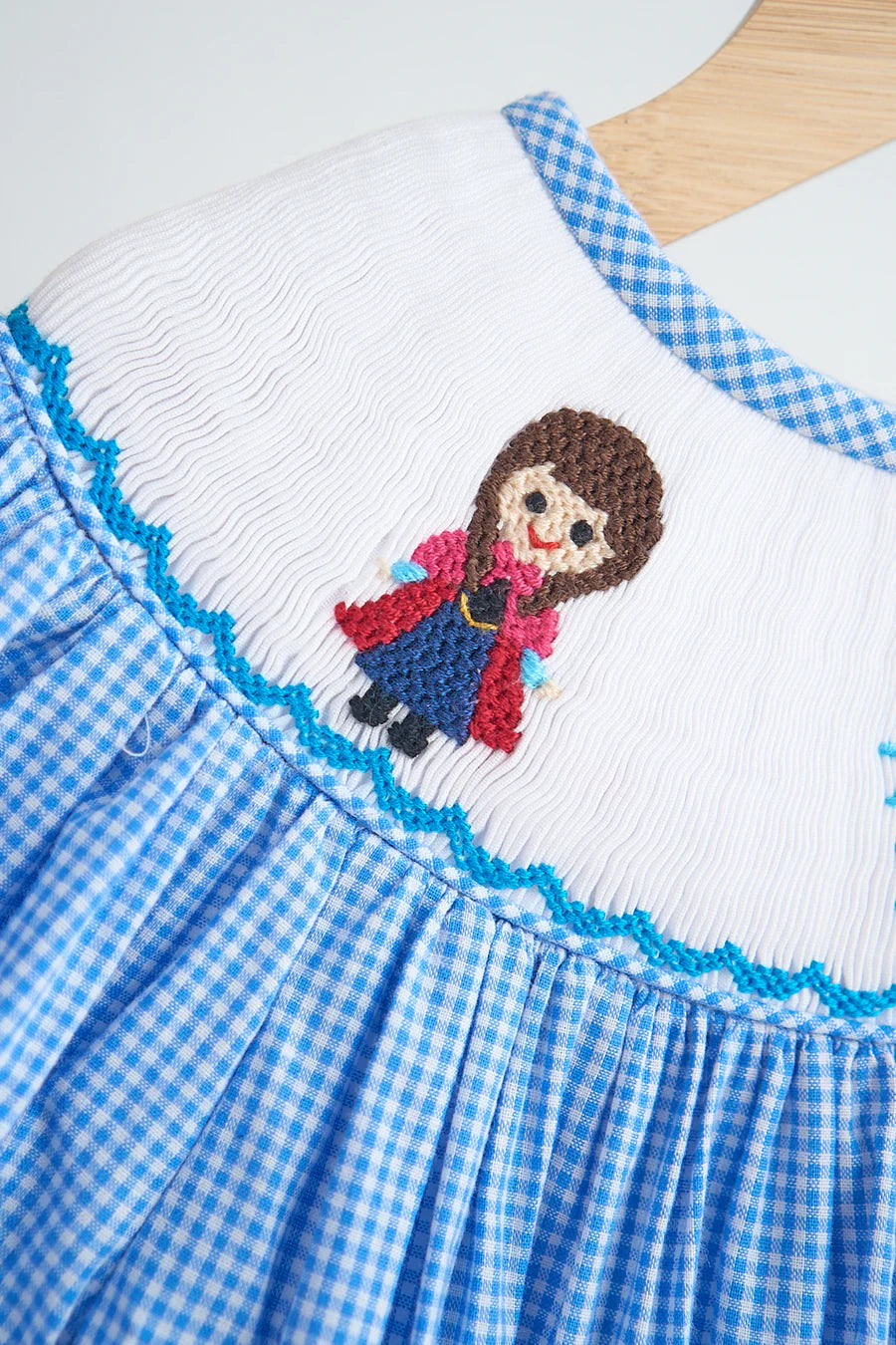 BLUE SNOW PRINCESS HAND SMOCKED GINGHAM DRESS