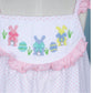 Hand-smocked Easter theme in white with tiny pink dot printed fabric dress