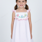 Hand-smocked Easter theme in white with tiny pink dot printed fabric dress