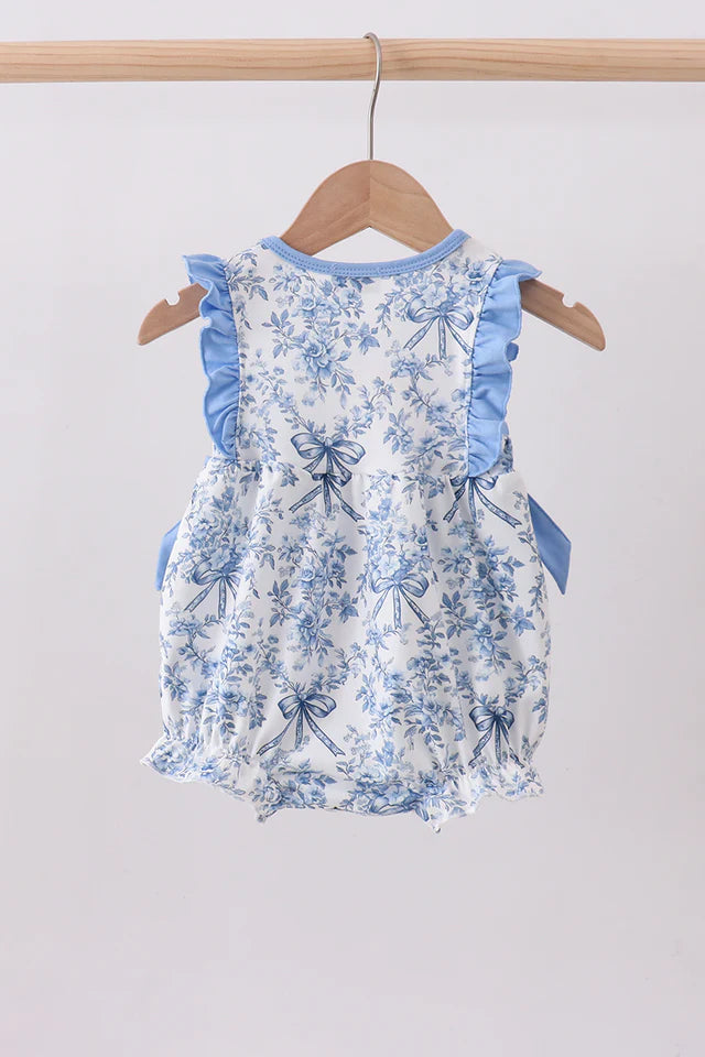 BLUE FLORAL CROSS SMOCKED RUFFLE BUBBLE