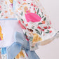 BLUE CHARACTER EMBROIDERY BOW RUFFLE BUBBLE