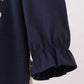 NAVY NATIVITY FRENCH KNOT RUFFLE BUBBLE