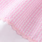 Pink character French knot seersucker dress with back bow