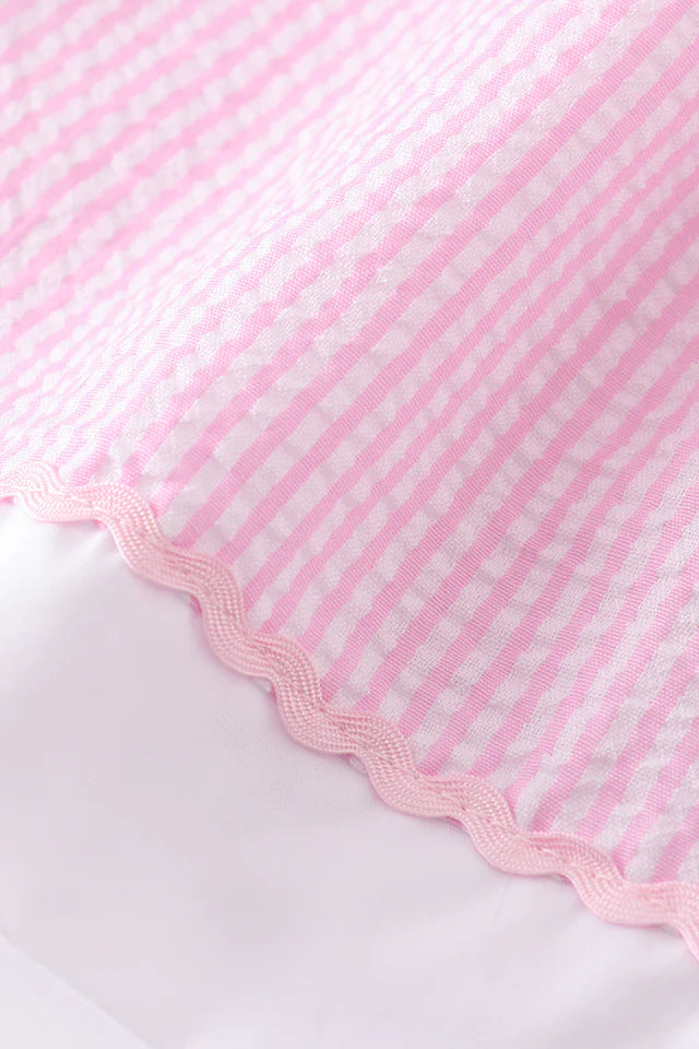 Pink character French knot seersucker dress with back bow
