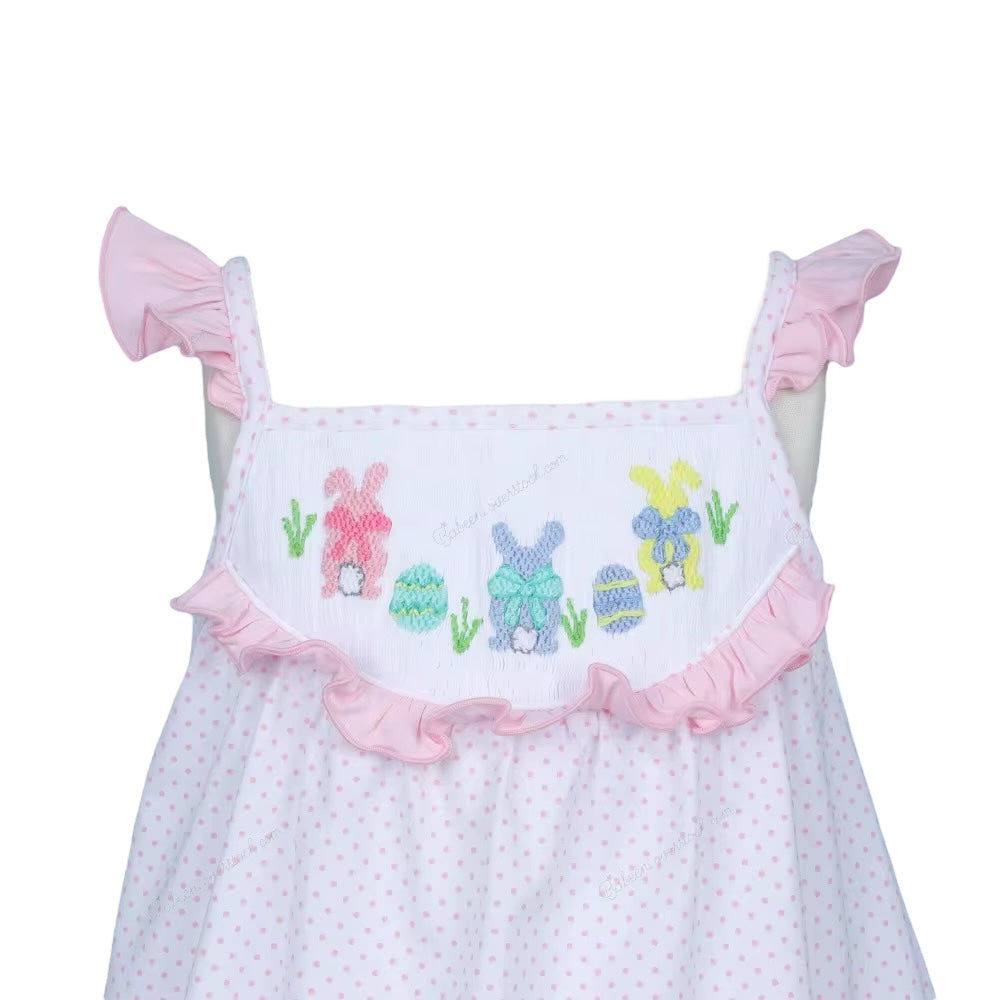 Hand-smocked Easter theme in white with tiny pink dot printed fabric dress